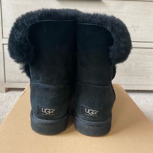 all black one button ugg boots